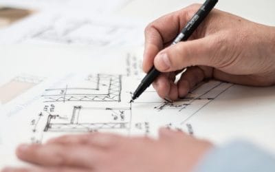 Architect drawing a house plan